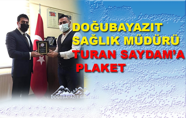 Milli Eğitimce Saydam’a plaket