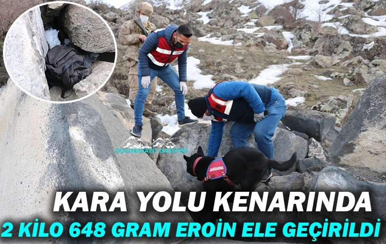 KARA YOLU KENARINDAKİ ARAZİDE TAŞLARIN ARASINA GİZLENMİŞ 2 KİLO 648 GRAM EROİN 